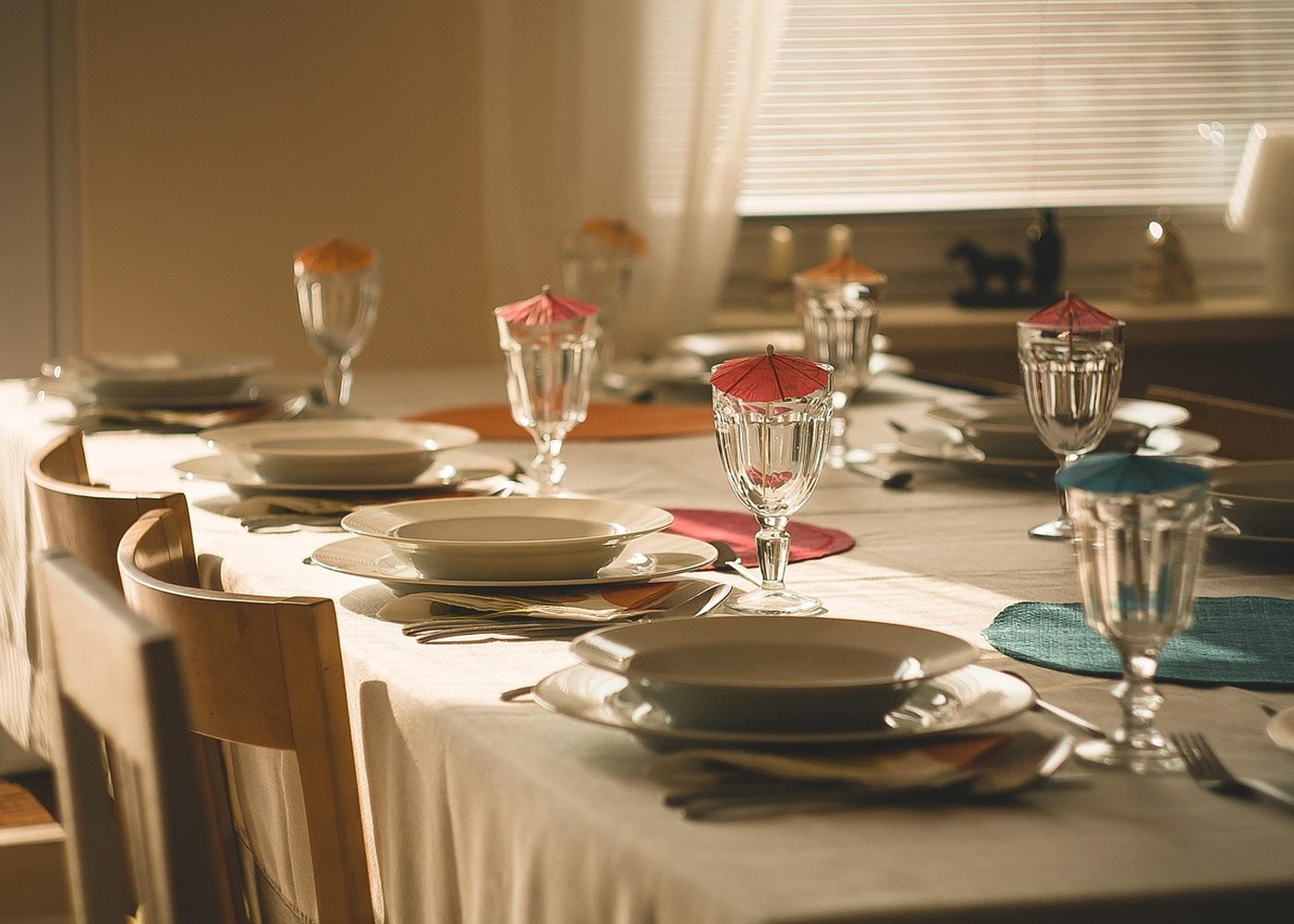 The dining room at Moturiki, set for the evening