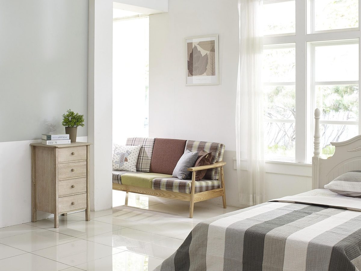 A Harbour Classic room with a queen bed and morning light