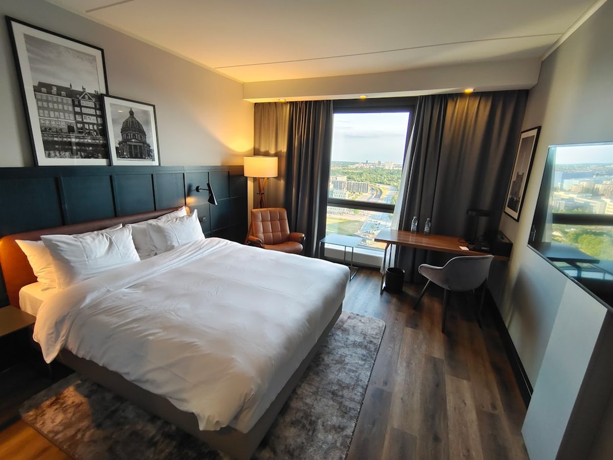 An Ocean Superior room with a king bed facing the window
